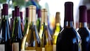 Bottles in different colors can already be found on the wine shelf