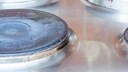 Gray stove tops can be made to shine again with a little cooking oil