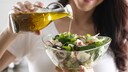 When it comes to storing cooking oil, opinions differ. Should it go in the refrigerator, or is a dark kitchen cabinet sufficient?