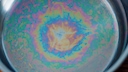 A chemical reaction can cause rainbow discolorations on the bottom of the pot.