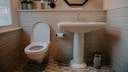 Before flushing, always make sure to close the toilet lid.