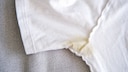 Unsightly deodorant stains are no reason to toss your T-shirt—simple home remedies can help.