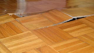 The longer moisture is ignored in the parquet, the more severe the damage becomes.