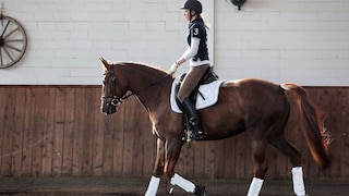 One person upright in the saddle