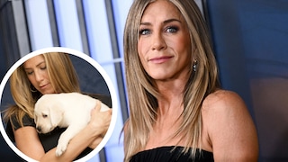 Jennifer Aniston Holding a Labrador Puppy