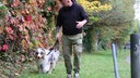 Dog trainer André Vogt with male dog Elvis during training