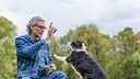 A man trains his dog