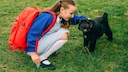 Schoolchild With Dog
