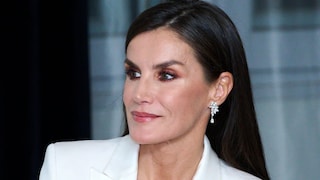 Close-up of Queen Letizia with stunning makeup and a white suit