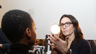 Bobbi Brown does make-up backstage at a Fashion Week show