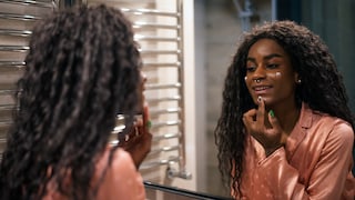 Woman applying night cream in front of a mirror. Could be any other cream, of course, but here the setting is relatively dark, so it can pass for evening. Do you know how difficult it is to find cream photos that aren't overexposed? It's like only applying cream in the morning