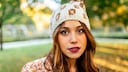 Woman with plum lipstick in the park