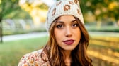 Woman with plum lipstick in the park