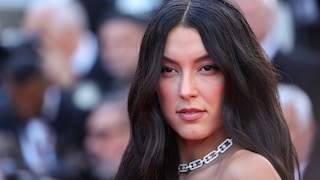 Rebecca Mir as we know her: long brown hair and no bangs in sight