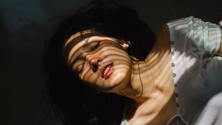 Sweating is also often part of the period, a woman lies down and seems to sweat