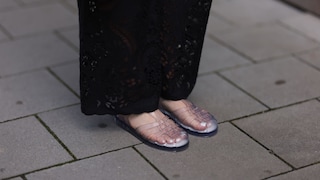 Jelly sandals, a popular footwear choice in the 1980s, have made a comeback in recent years. Known for their colorful, translucent design and flexible material, these sandals are both nostalgic and trendy. They are often made from PVC, a type of plastic that allows for a variety of vibrant colors and styles. While they are fashionable, some wearers note that jelly sandals can be less comfortable for extended wear due to their lack of breathability and support. Despite this, their playful aesthetic continues to attract a wide range of consumers, from fashion-forward individuals to those seeking a touch of retro flair.