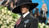 Rihanna loves extravagant accessories, whether it's oversized hats or a giant baguette bag.