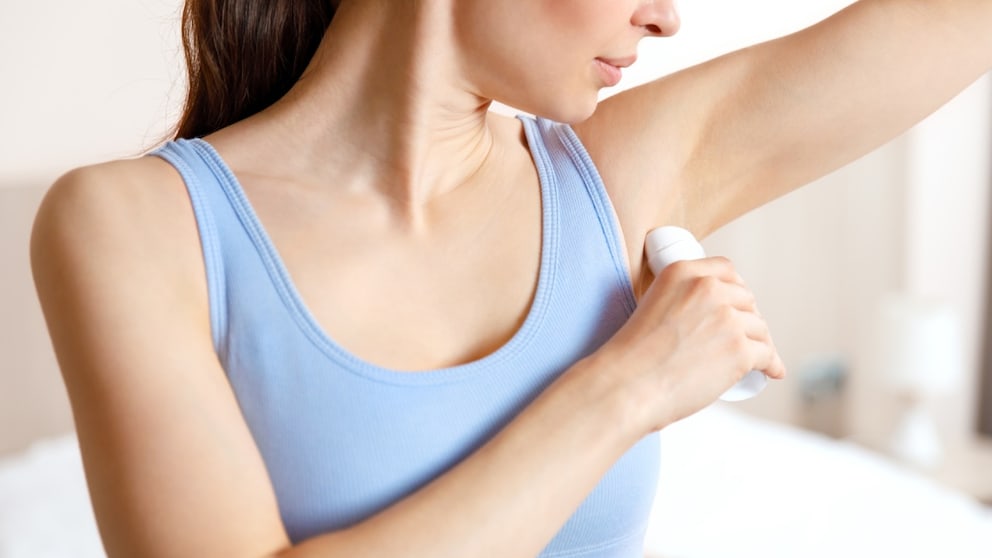 Woman Holding a Deodorant Stick