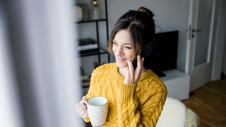 Woman on the Phone by the Window