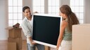 Man and Woman Carry Large TV – Lidl Offer
