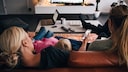 42-Inch OLED TV: Two Women and a Girl Watching Television