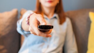 Woman with Remote Control