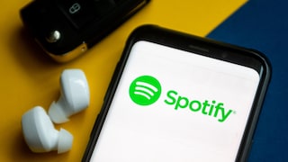 Spotify Live: Logo on Smartphone Next to Headphones