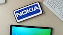 Nokia's Old and New Logos Side by Side on Smartphone