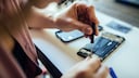 Samsung Self-Repair Service: Woman Repairs Smartphone