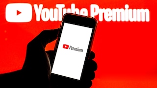 YouTube Premium Price Increase: YouTube Premium Logo on Phone Against Red YouTube Background
