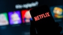 Netflix's One Piece Series: Symbolic Image of Netflix Logo on Smartphone