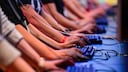 Gamescom 2023 Expectations: A Symbolic Image of Many Gamers Playing Side by Side