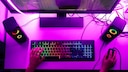 Gaming Black Friday: Gaming Setup with PC, Keyboard, and Mouse in Purple Light