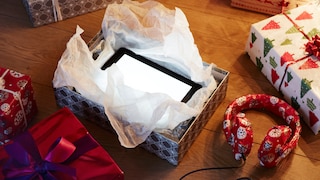 Stock Image: Tablet and Over-Ear Headphones as Christmas Gifts