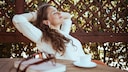 Digital Detox: A Woman Relaxing With a Cup of Coffee