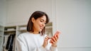 Woman with cell phone in hand