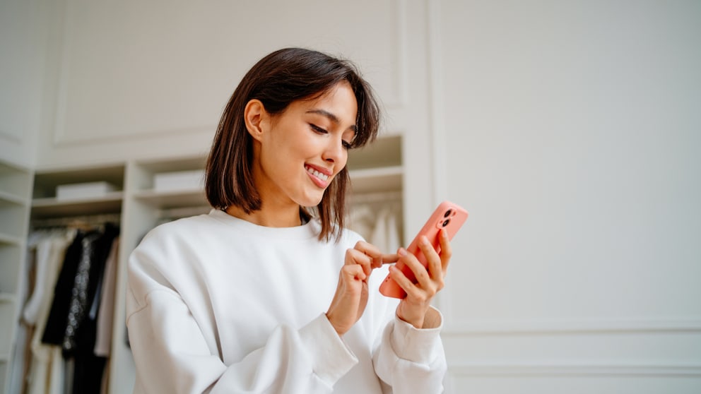 Woman with cell phone in hand