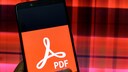PDF bigger than the universe: PDF logo on smartphone