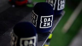 Several DAZN microphones lined up.