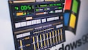 The program Winamp is playing a song.