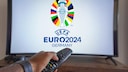 Logo of Euro 2024 on a television.