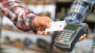 Man uses card payment in the store.