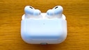 AirPods 4 in charging case