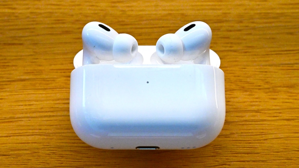 AirPods 4 in charging case