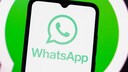 WhatsApp logo on a smartphone