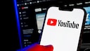 YouTube logo on a smartphone