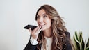 Woman records voice message