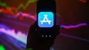Apple App Store logo on a smartphone
