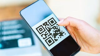 A QR code on a smartphone