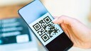 A QR code on a smartphone